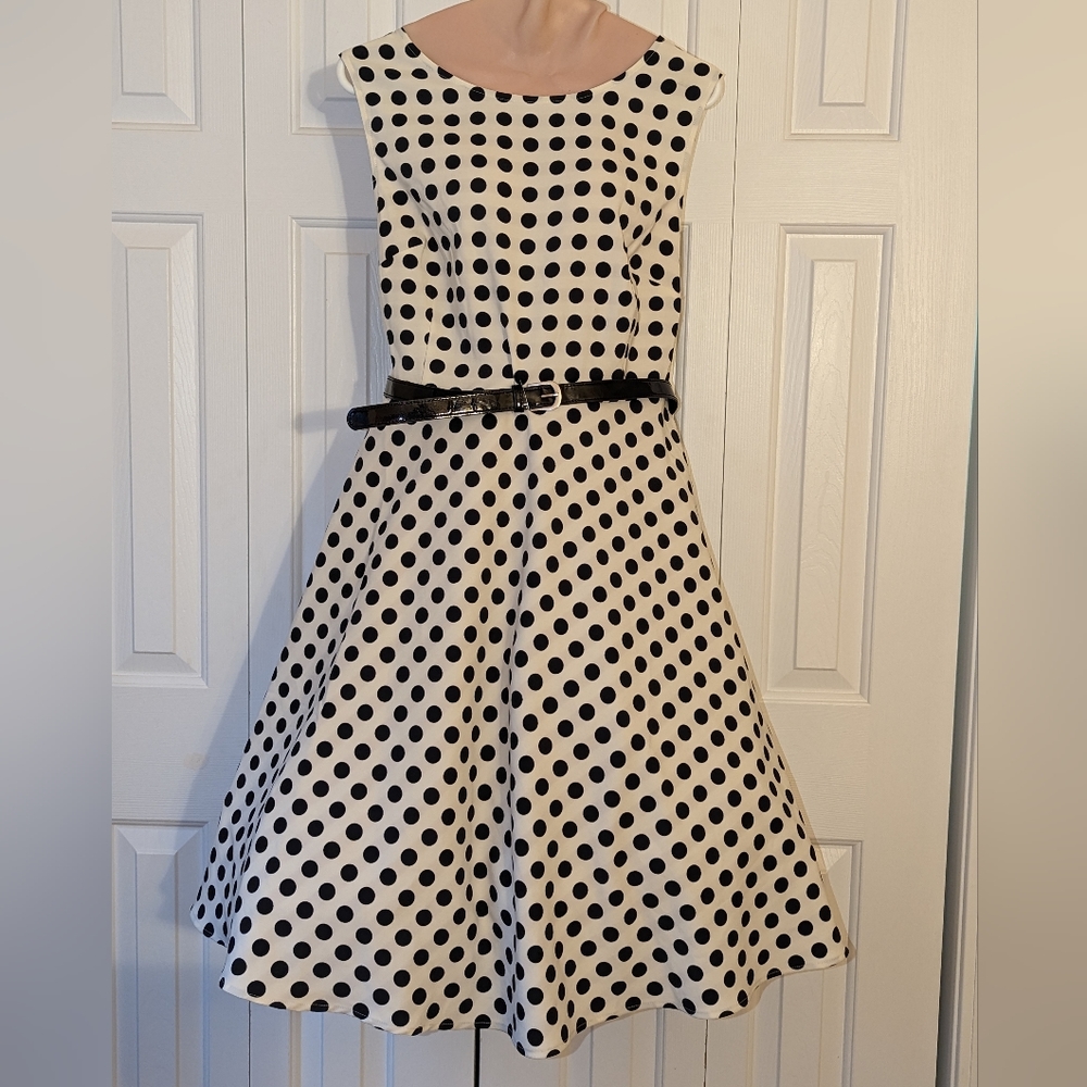Black polka dot fit and flare dress.